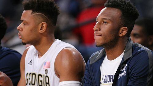 Injured Georgia Tech guard Josh Okogie watches from the bench during a 52-51 victory over Northwestern in a NCAA college basketball game on Tuesday, November 28, 2017, in Atlanta.   Curtis Compton/ccompton@ajc.com