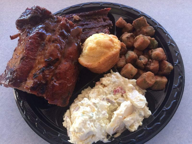 This two-meat combo plate at Sam’s BBQ-1 in east Cobb includes baby back ribs and brisket, plus fried okra, potato salad and a corn muffin. CONTRIBUTED BY WENDELL BROCK