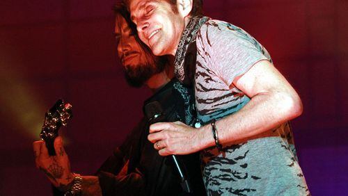 Dave Navarro and Perry Farrell share a moment. Photo: Robb Cohen Photography & Video/ www.RobbsPhotos.com