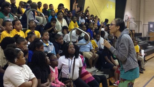 Author and attorney Sherri Graves Smith speaks to students last year at Bush Elementary in Birmingham, Ala. Smith lost her battle with colon cancer on Nov. 2 surrounded by family. CONTRIBUTED