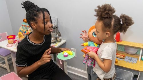 Tannyetta Robinson plays with her 4-year-old daughter Ayla in their Atlanta apartment. The nonprofit Our House, which helps the homeless get back on their feet, helped her get the apartment. PHIL SKINNER FOR THE ATLANTA JOURNAL-CONSTITUTION