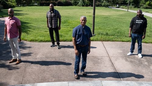 Craig Washington (from left), Anthony Antoine, the Rev. Duncan Teague and Charles Stephens were all members of the Second Sunday group that met from the early '90s to the early 2000s near the Historic Fourth Ward Park, where a historical marker will be erected. Ben Gray/For the AJC
