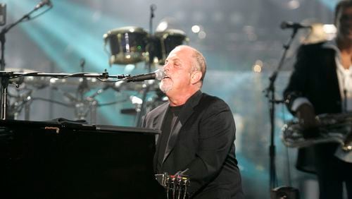 Billy Joel performs at Shea Stadium Wednesday, July 16, 2008  in the Queens borough of New York. (AP Photo/Frank Franklin II)