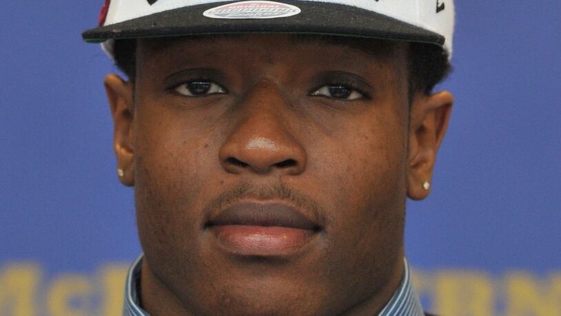 February 2, 2012 - POWDER SPRINGS: Darius English wears his South Carolina hat during National Signing Day at McEachern High School in Powder Springs on Wednesday, February 2, 2012. Johnny Crawford jcrawford@ajc.com