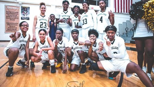 Douglass's girls basketball team is in the state basketball finals for the first time in the 50th-anniversary academic year for the Atlanta school. The Astros, shown here after winning the Region 6-AA tournament champinship last month, will play Early County on Thursday at 2 p.m. in Macon for the Class AA title.