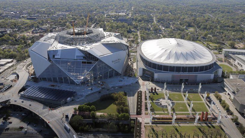 Construction continues on Mercedes-Benz Stadium, next door to the Georgia Dome. Aerial photo was shot on March 31. BOB ANDRES /BANDRES@AJC.COM