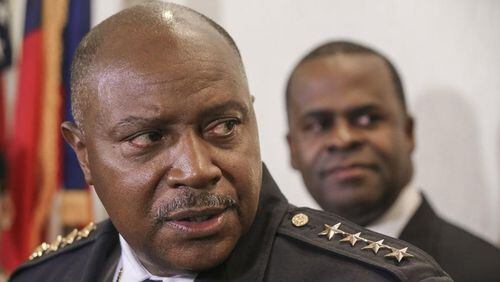 Police Chief George Turner and Mayor Kasim Reed at a city hall press conference in December at which Reed announced that deputy chief Erika Shields would succeed the retiring Turner. John Spink / jspink@ajc.com