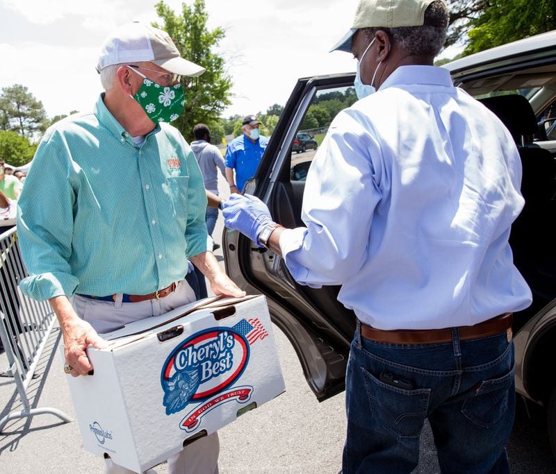 Georgia Agriculture Commissioner Gary Black, left, shown working alongside DeKalb County CEO Michael Thurmond has amassed the most formidable grassroots network of all three Republicans now running for the U.S. Senate. (Jenni Girtman for Atlanta Journal Constitution)
