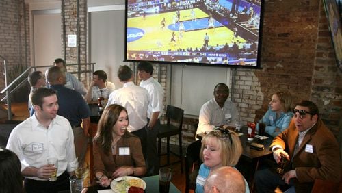 STATS sports bar is expanding with a brewery. / AJC file photo