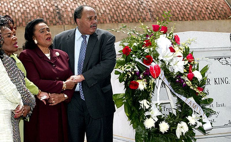Coretta Scott King and her son Martin Luther King III attend an April 2005 ceremony marking the 37th anniversary of Martin Luther King Jr.'s assassination. (W.A. Harewood / AP)