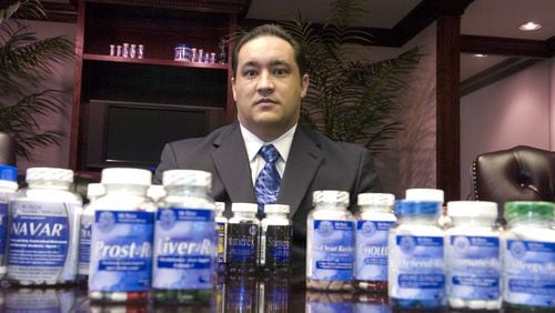 Hi-Tech Pharmaceuticals president and CEO Jared Wheat is shown at the company’s headquarters in Norcross in 2007. The dietary supplement manufacturer is facing a variety of new federal charges that could send him to prison for a third time.