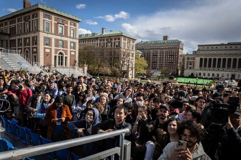 Students and press look on as Speaker of the House Mike Johnson (R-LA) speaks to the media on the Lower Library steps on Columbia University's campus in New York on Wednesday April 24, 2024. (AP Photo/Stefan Jeremiah)
