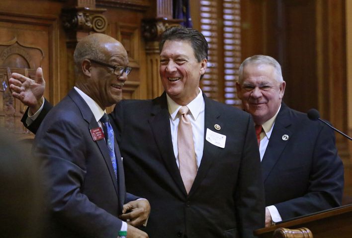 Jan. 14, 2016 - Atlanta - U.S. Rep. Lynn Westmoreland, who served in the Georgia House in 1993, was introduced by Rep. Calvin Smyre (left), D - Columbus, as a guest speaker, as Speaker of the House David Ralston looks on. Westmoreland, who has announced he is not running for reelection to congress. Activity in the House and Senate was mostly ceremonial today. Deal administration officials (Chief of Staff Chris Riley and Office of Planning and Budget Director Theresa MacCartney) held a briefing on the FY17 budget and members of the Georgia House Democratic Caucus released it's 2016 legislative agenda. BOB ANDRES / BANDRES@AJC.COM