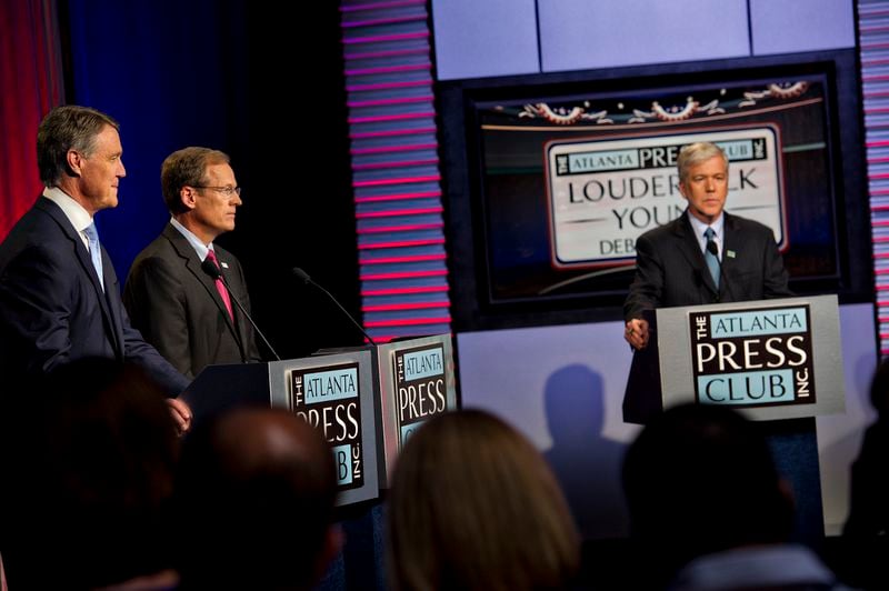 July 13, 2014 Atlanta - U.S. Senate Republican candidates David Perdue (left) and Jack Kingston answer questions from panelists as Dennis O'Hayer moderates during the Atlanta Press Club's Loudermilk-Young Debate Series. AJC/Jonathan Phillips