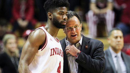 Head coach Tom Crean of the Indiana Hoosiers talks with Robert Johnson #4 in the second half against the Nebraska Cornhuskers at Assembly Hall on December 28, 2016 in Bloomington, Indiana. (Photo by Dylan Buell/Getty Images)