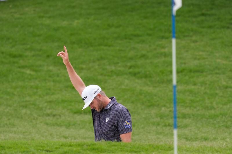 Taylor Pendrith reacts after sinking a birdie from the sand on the sixth green during the final round of the Byron Nelson golf tournament in McKinney, Texas, Sunday, May 5, 2024. (AP Photo/LM Otero)
