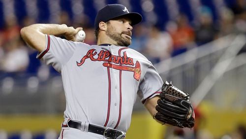 Josh Collmenter, who impressed in three late-season starts for the Braves, was re-signed to a one-year deal Monday. (AP Photo/Alan Diaz)