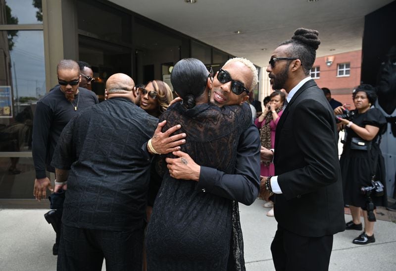 Dallas Austin embraces a guest as he arrives for the funeral service of Rico Wade at Ebenezer Baptist Church on Friday, April 26, 2024. Rico Wade, an architect of Southern Hip Hop and one-third of the Grammy-nominated, multi-platinum-selling legendary production team Organized Noize and the de facto leader of The Dungeon Family, will be eulogized privately and by invitation only for family and friends on Friday, April 26, 2024. (Hyosub Shin / AJC)