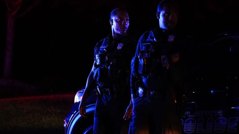 Atlanta police officers are seen on Benjamin E. Mays drive after a shooting early Sunday, May 28, 2023.