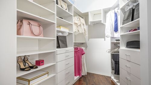Shelves and drawers help make this closet feel functional and organized. (Design Recipes)