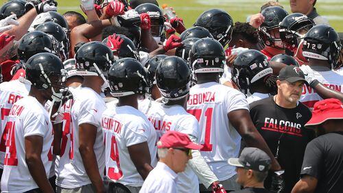 May 12, 2017, Flowery Branch: Falcons head coach Dan Quinn and his new players take the field during rookie mini-camp on Friday, May 12, 2017, in Flowery Branch. Curtis Compton/ccompton@ajc.com