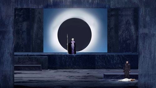 This rendering of a scene from Atlanta Opera's "Die Walküre" shows Brünnhilde in the eclipse, with Siegfried and Sieglinde at the front. (Stage rendering by scenic and projection designer Erhard Rom; costume rendering by costume designer Mattie Ullrich.)