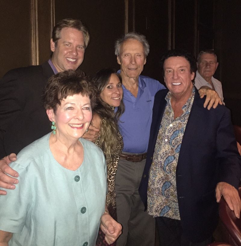  Jazz man Joe Gransden, left, with his buddy Clint Eastwood, center, Cafe 290 owner John Scatena, right, Michelle McKenna of Cafe 290 Records and patron Nancy Battaglia, in front, at Joe's recent show at Venkman's. Photo provided to the AJC.