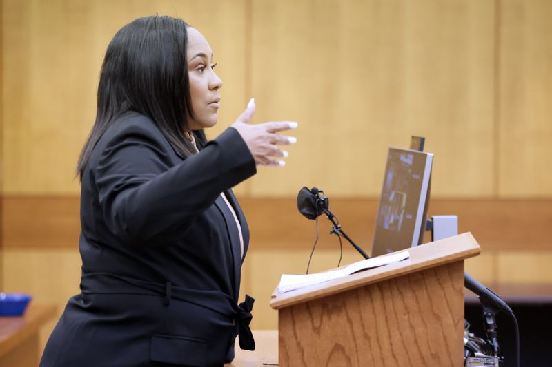Fulton County District Attorney Fani Willis plans to announce this summer — sometime between July 11 and Sept. 1 — whether she will bring charges against former President Donald Trump or any of his allies. (Miguel Martinez for the AJC)