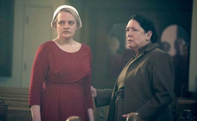 This image released by Hulu shows Elisabeth Moss, left, and Ann Dowd in a scene from "The Handmaid's Tale." The program was nominated for an Emmy on Thursday for outstanding drama series. The 70th Emmy Awards will be held on Monday, Sept. 17. (George Kraychyk/Hulu via AP)