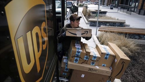 A UPS driver prepares to deliver packages. (2018 AP file photo/Patrick Semansky)