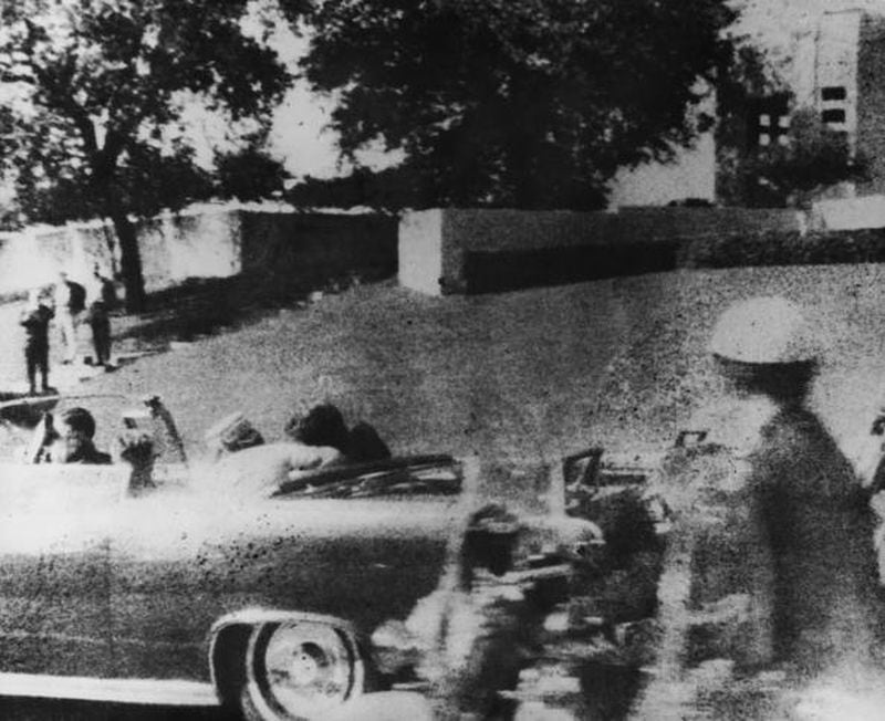 American president John F. Kennedy (1917 - 1963) is struck by an assassin's bullet as he travels through Dallas in a motorcade, 22nd November 1963. In the car next to him is his wife Jacqueline (1929 - 1994) and in the front seat is Texas governor John Connally. (Photo by Three Lions/Hulton Archive/Getty Images)