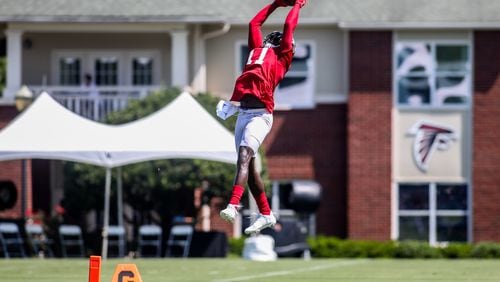 Wide receiver Julio Jones (11) makes a catch during training camp, Saturday, July 28, 2018, in Flowery Branch, Ga.  BRANDEN CAMP/SPECIAL