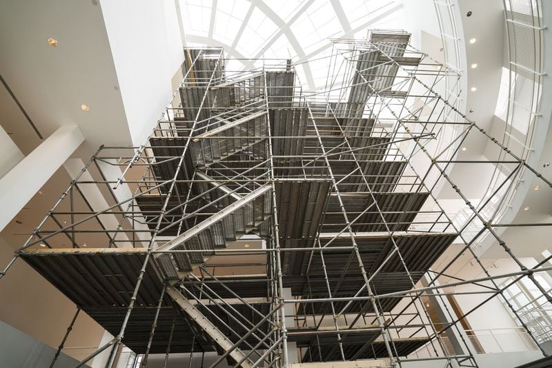 Scaffolding in the atrium of the Stent Family Wing rose up in preparation for the return of a 60-foot-tall work by minimalist Sol LeWitt. CONTRIBUTED BY HIGH MUSEUM OF ART