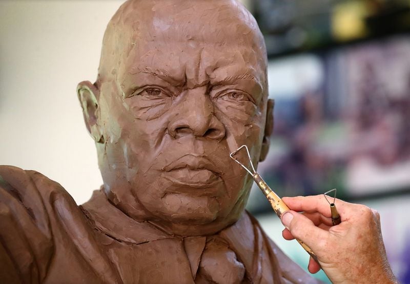 072820 Cumming: Sculptor Gregory Johnson begins working on the facial details of his one and one-third life size statue of John Lewis made with 800 pounds of clay that will be cast in bronze at his studio on Tuesday, July 28, 2020 in Cumming.    Curtis Compton ccompton@ajc.com