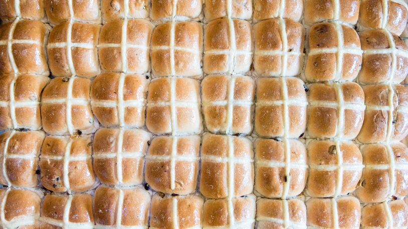 Hot cross buns fresh from the oven at Australian Bakery Cafe. CONTRIBUTED BY HENRI HOLLIS