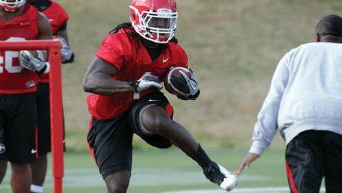 032012 ATHENS : UGA tailback Isaiah Crowell runs through a foot drill on the opening day of spring football practice in Athens, Tuesday, March 20, 2012. Curtis Compton ccompton@ajc.com UGA tailback Isaiah Crowell runs through a foot drill on the opening day of spring football practice in Athens. Curtis Compton ccompton@ajc.com