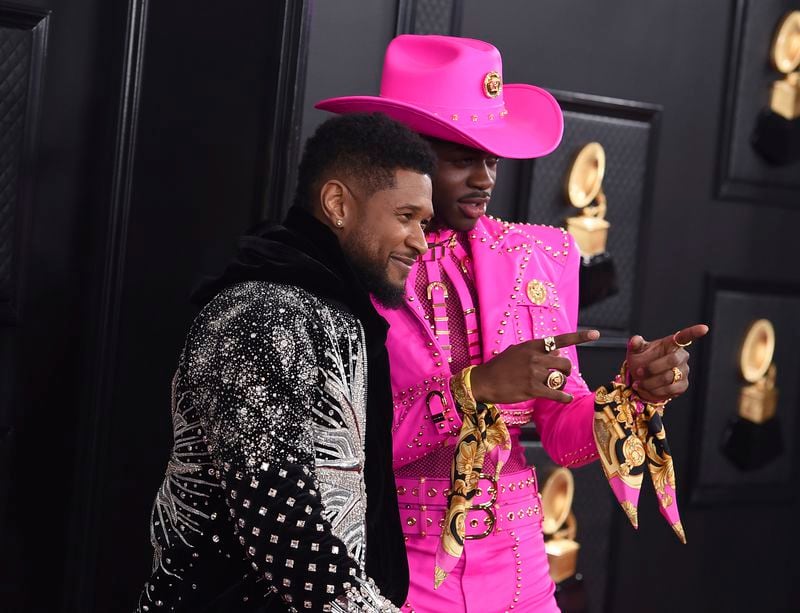 Usher, left, and Lil Nas X represented Atlanta at the 62nd annual Grammy Awards at the Staples Center on Sunday, Jan. 26, 2020, in Los Angeles. (Photo by Jordan Strauss/Invision/AP)