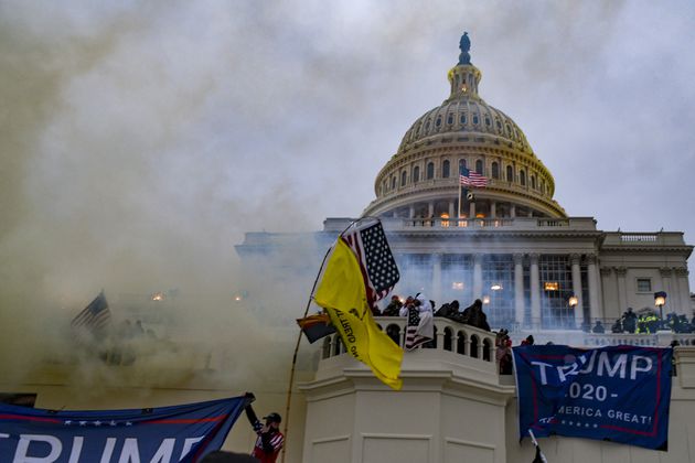 
                        FILE — Rioters force their way into the Capitol in Washington, Jan. 6, 2021. The justices will hear arguments on Tuesday, April 16, 2024 in a case that could alter hundreds of prosecutions for the assault on the Capitol and help define its meaning. (Kenny Holston/The New York Times)
                      