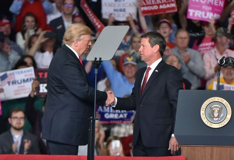 Then-President Donald Trump shakes hands with Brian Kemp, his pick in the 2018 GOP primary race for governor. They are no longer on such friendly terms, with Trump frequently unleashing verbal attacks on Kemp for not helping to overturn the results of the 2020 presidential election in Georgia. But Kemp has chosen not to fire back, often saying, "I’ve never once said a bad word about Trump.” HYOSUB SHIN / HSHIN@AJC.COM