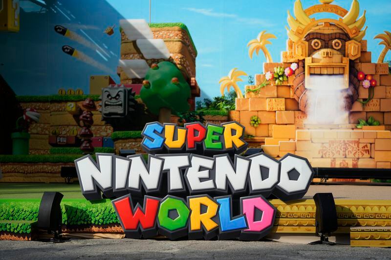 FILE - This photo shows a logo of the Super Nintendo World during an event in Tokyo, on Feb. 15, 2024. Japanese video-game maker Nintendo said Tuesday, May 7, 2024 that it will make an announcement about a successor to its Switch home console sometime before March 2025. (AP Photo/Hiro Komae, File)