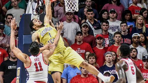 Georgia Tech guard Tadric Jackson (1) misses on a dunk attempt as Mississippi forward Sebastian Saiz (11) defends as Mississippi forward Marcanvis Hymon (5) looks on during an NCAA college basketball game in the quarterfinals of the NIT on Tuesday, March 21, 2017, in Oxford, Miss. (Bruce Newman/The Oxford Eagle via AP)