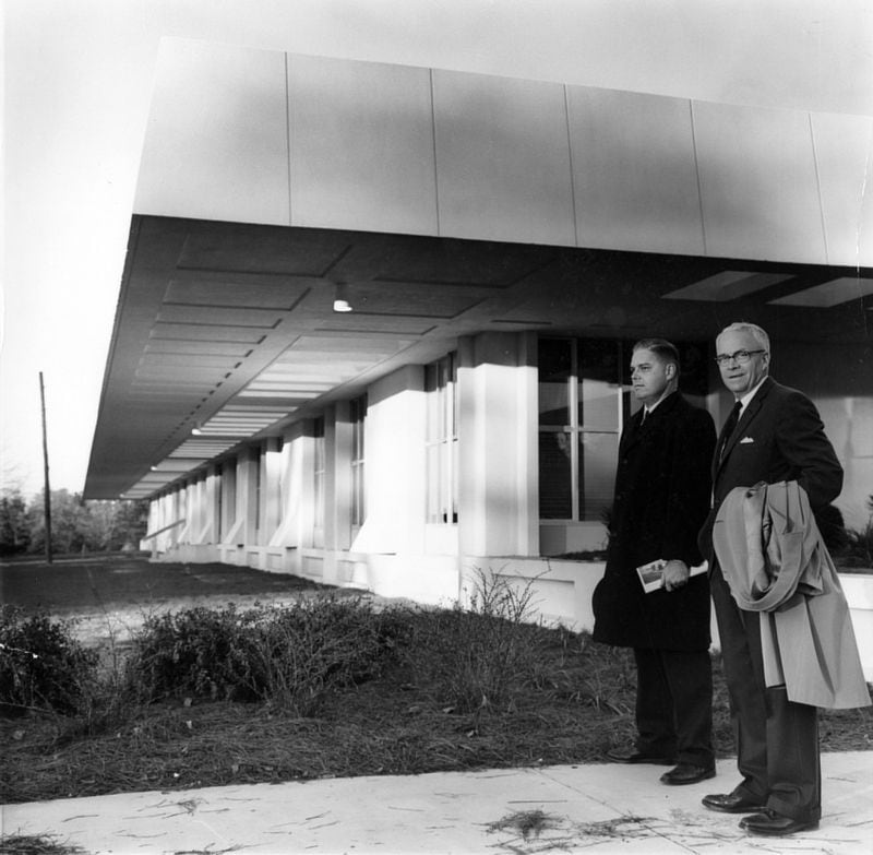 Mayor Ivan Allen, right, with an unidentified man outside the newly constructed Harper High School, Dec. 11, 1962. (Ken Patterson / AJC Archive at GSU Library AJCP296-056a)