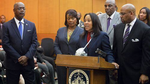 Prosecutors speak during a press conference following sentencing for 10 of the 11 defendants convicted of racketeering and other charges in the Atlanta Public Schools test-cheating trial. Kent D. Johnson/Atlanta Journal-Constitution.