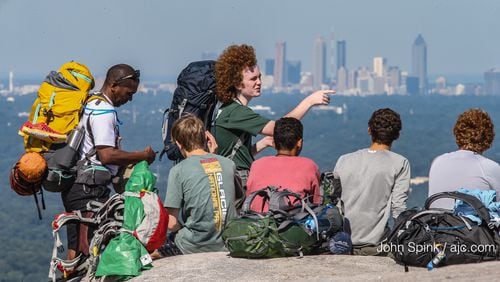 Boy Scout Troop 477 from Dunwoody took advantage of the pleasant weather on a hike up Stone Mountain on Tuesday. JOHN SPINK / JSPINK@AJC.COM