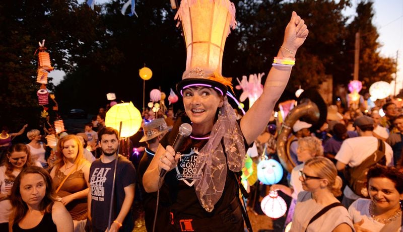 In 2013, the year the Beltline Lantern Parade crossed from hundreds of participants into thousands, Rytter addressed the crowd before stepping off. The parade is expected to attract at least 60,000 people this year. HYOSUB SHIN / HSHIN@AJC.COM