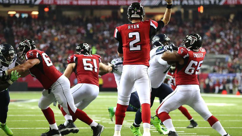 Matt Ryan passes against the Seahawks during the first half in a NFL football NFC divisional playoff game on Saturday, Jan. 14, 2017, in Atlanta. Curtis Compton/ccompton@ajc.com