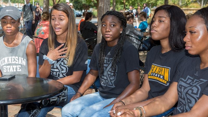 (left to right) Former Kennesaw State University cheerleaders Taylor McIver, Michaelyn Wright, Tommia Dean, Kennedy Town & Shlondra Young talk about their protest before a Saturday night's football game during an interview at the campus commons. The cheerleaders took a knee during the national anthem, the squad didn’t take the field at all during pregame activities. The university has changed its policy to prevent cheerleaders from doing anything like that in the future. KSU has said this change has nothing to do with the cheerleaders kneeling. 