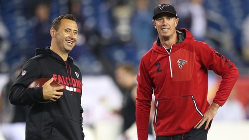 The Falcons, led by offensive coordinator Steve Sarkisian, left, and quarterback Matt Ryan, need to improve the team’s touchdown percentage in the red zone.