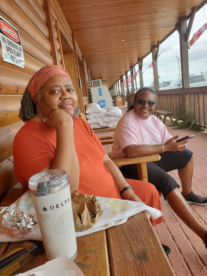 COVID-19 survivor Janice Cockfield (foreground) and her "baby" sister Sheila Cockfield relax after finishing lunch during a day trip to Carroll's Sausage & Country Store in Ashburn, Georgia, on October 9, 2020. (Credit: Janese Cockfield / Contributed)