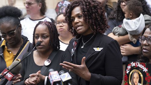Valerie Handy-Carey (right) speaks Friday about her daughter, Brittany Glover, who was killed in a hit-and-run crash last year.